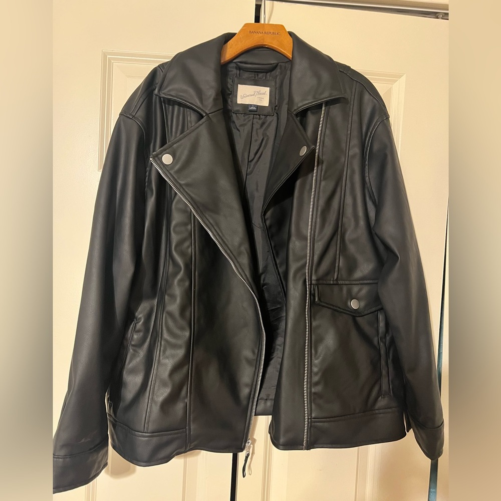 Black leather jacket. Size large never worn